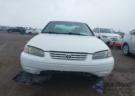 1999 Toyota Camry Le z USA, uszkodzony, nr VIN JT2BG22K0X0300834